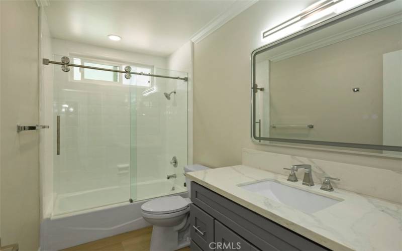 Completely New 2ndary Bath including tub, vanity, counters, mirror and more!