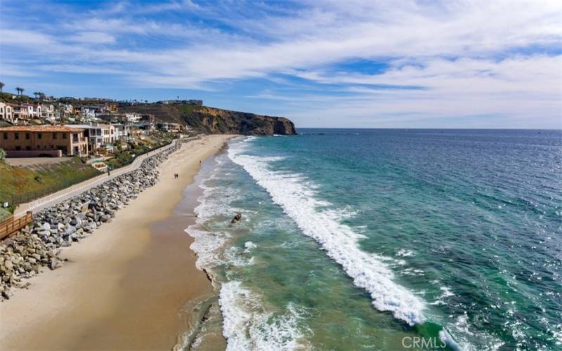 Looking south to the headlands. this beach is where life guards learn to master the waves by running and swimming more laps than you think you can take in the heat!