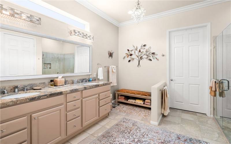 Remodeled Primary Bath with Granite Countertops and Double Sinks