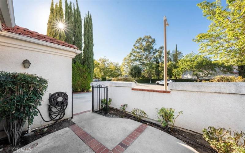 Forward walled patio off living room