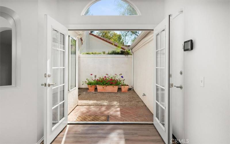 French doors to the atrium off entry