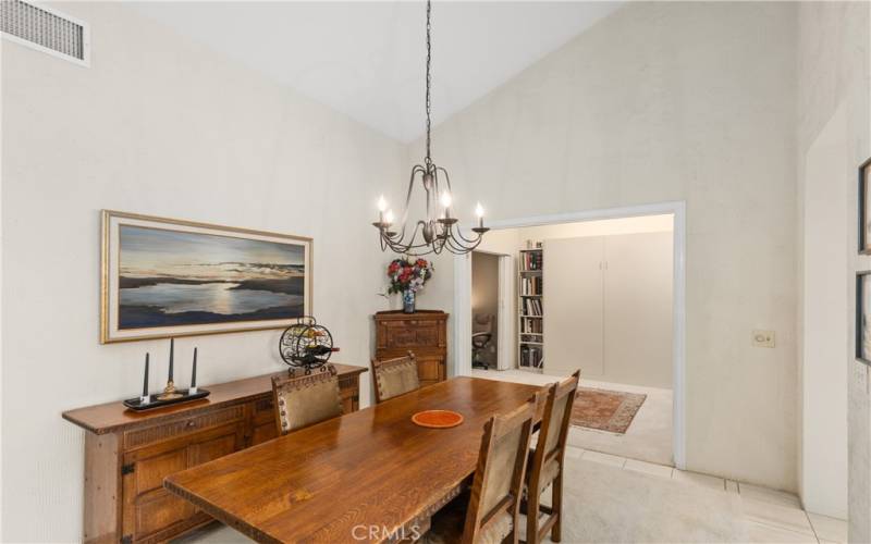 Dining Room opens to  flex space that can be left open or closed off