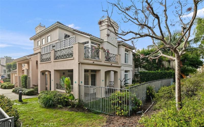 Ground floor unit with covered patio + private sideyard.