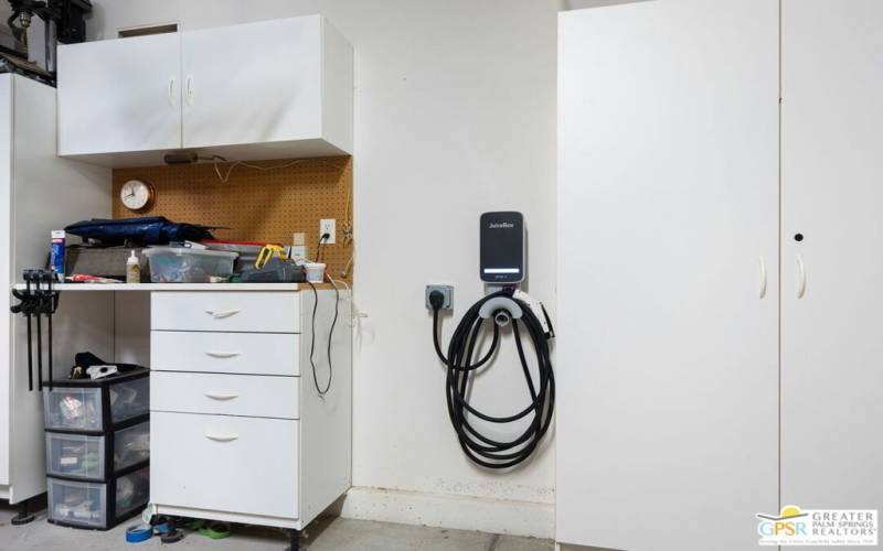 EV charger in garage - reaches both car spaces