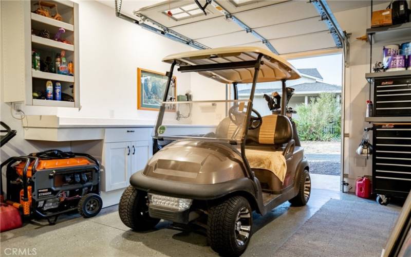 Garage with dedicated garage door for your golf cart.