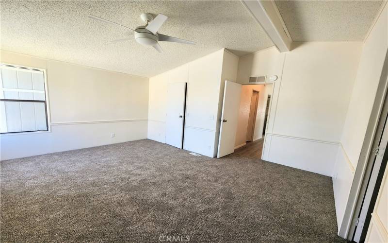 Master Bedroom with new Carpet and Ceiling Fam