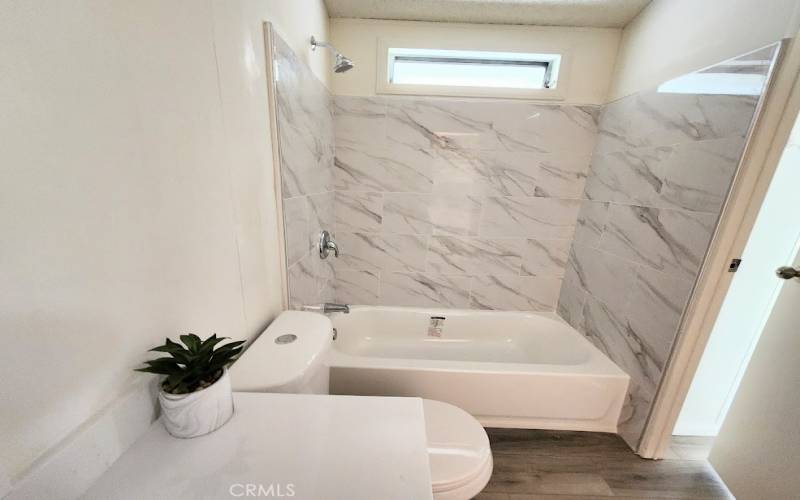 Marble Style Updated Guest Bathroom