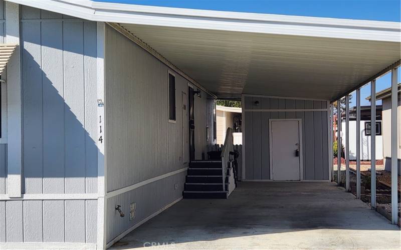 Covered Carport with shed