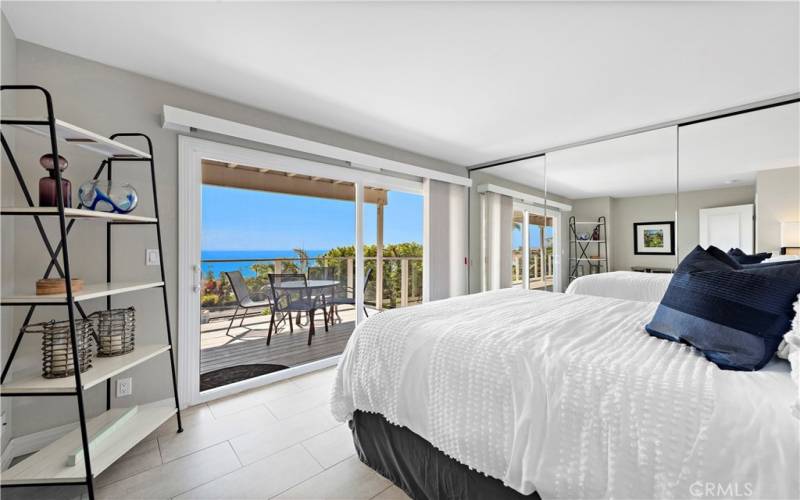 Large guest suite with private balcony and ocean view