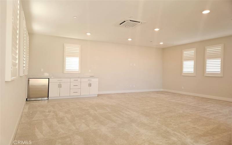 Bonus Room with open view covered deck and wine fridge