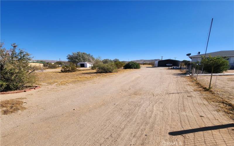 Large circular driveway on the side -plenty of room for RV Access and large 2 car covered carport