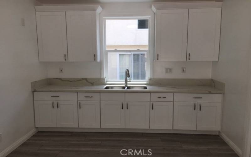 wet bar next to kitchen