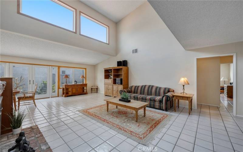 Off living room is hallway with first floor bedroom and bath.