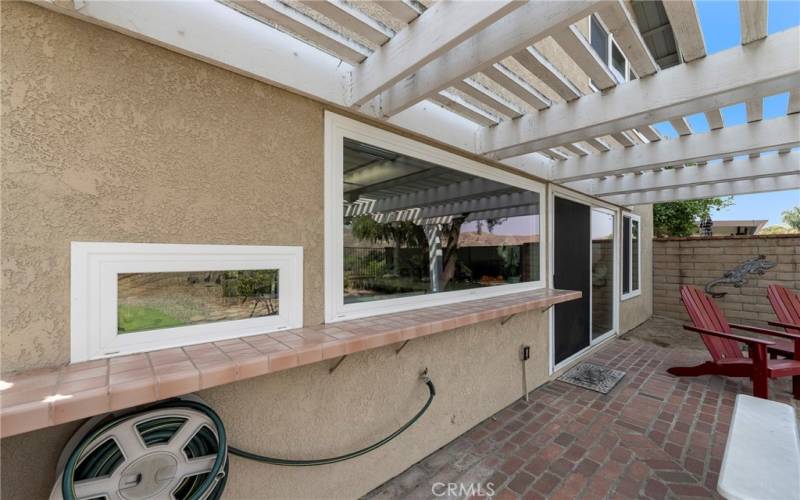 Counter across back of house for backyard entertainment.