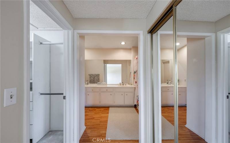 Main bedroom has a second closet with mirrored sliding doors.