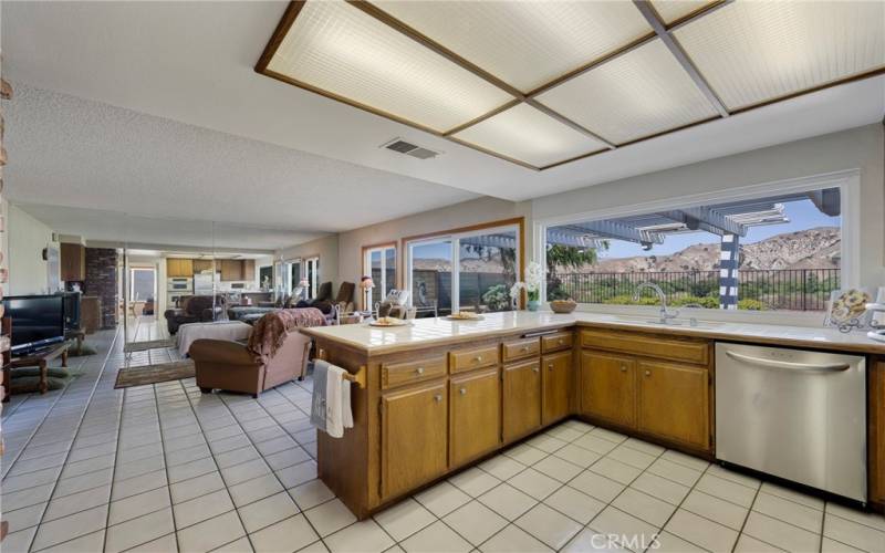 Kitchen/family room boasts serene views of hills.