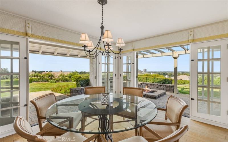 Dinning area that opens to the patio.  You can have a Catalina Island sunset view from your dinning table