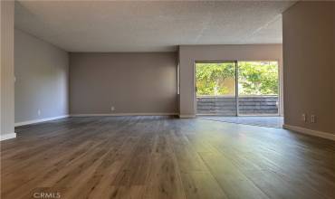 Livingroom, dining room, open floor plan.  Laminate floors throughout.