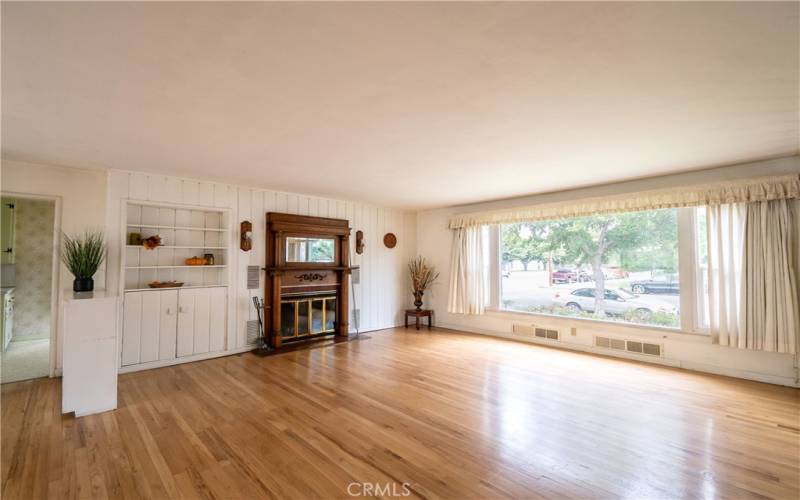 Living room w/fireplace & lots of light