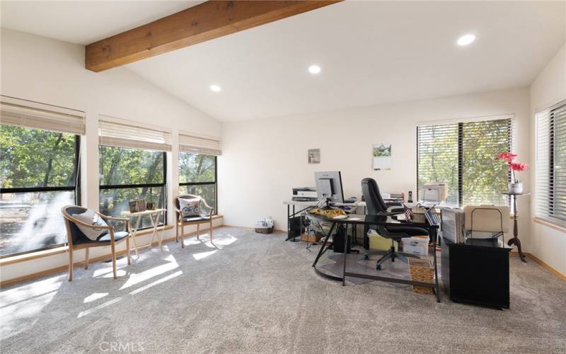 1 of 2 living rooms, currently used as an office.  Enjoy the natural light of this room