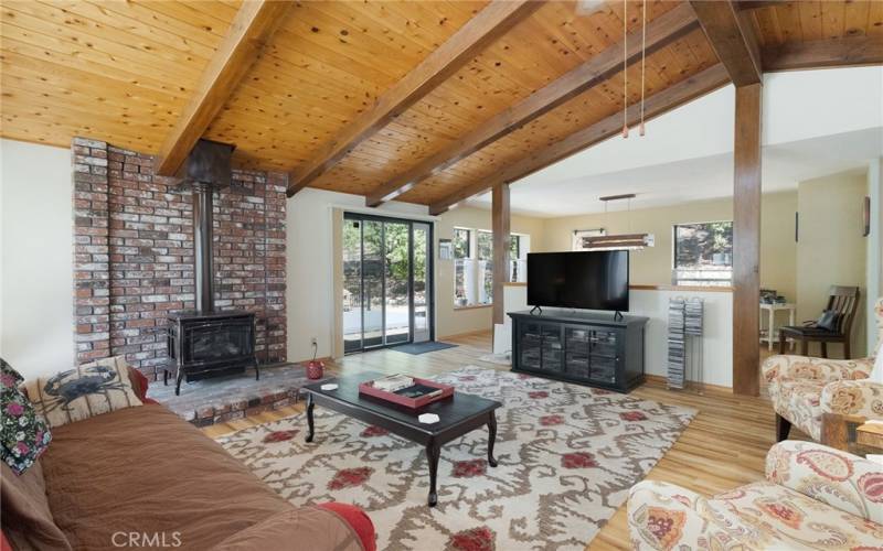 2nd Living room with a gas fireplace with access to the backyard as well as the deck