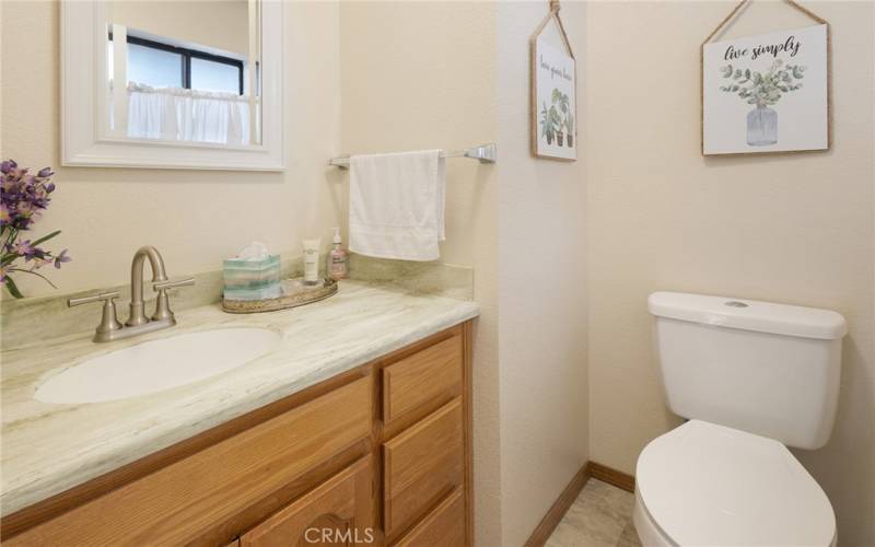 bathroom off kitchen by garage door