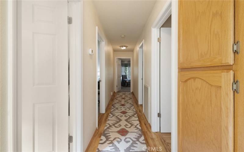 Hallway to bedrooms, laundry and guest bathroom