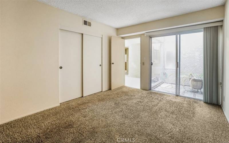 The second bedroom has access to the atrium.