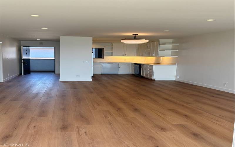 Beautifully renovated kitchen is open to the living room.