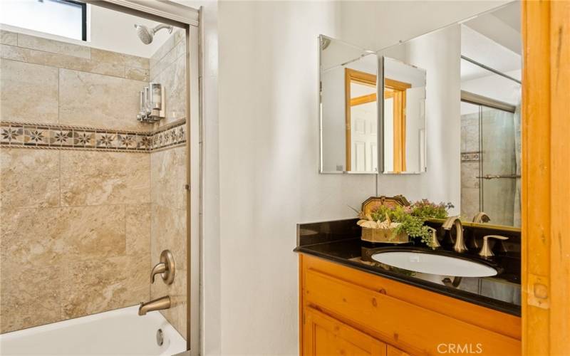 2nd floor full bathroom with custom tile