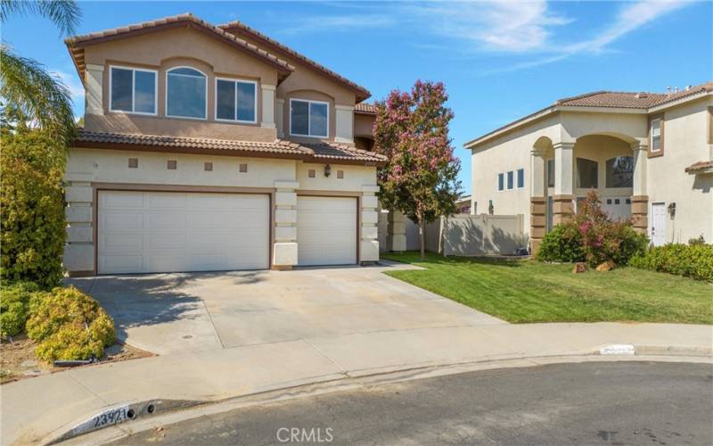 3 car garage and long driveway