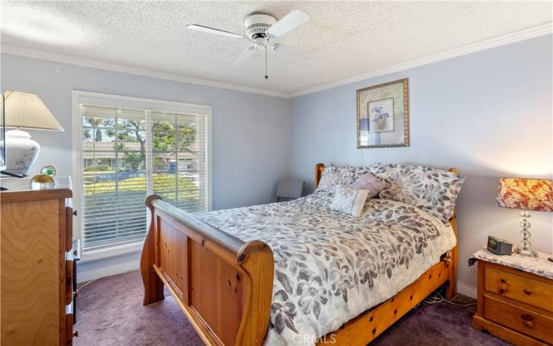 Bedroom #3 is slightly larger than the first two with crown molding, ceiling fan and window blinds!