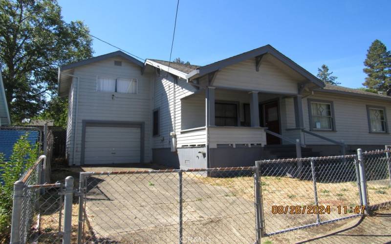 East front with garage