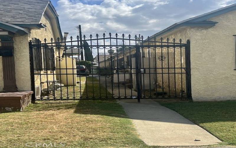 Side gate to both properties