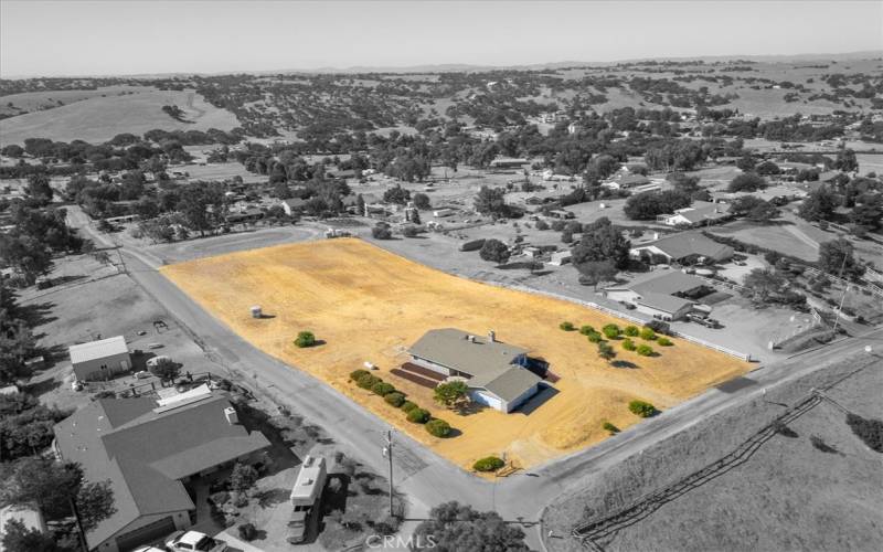 Aerial featuring home and acreage