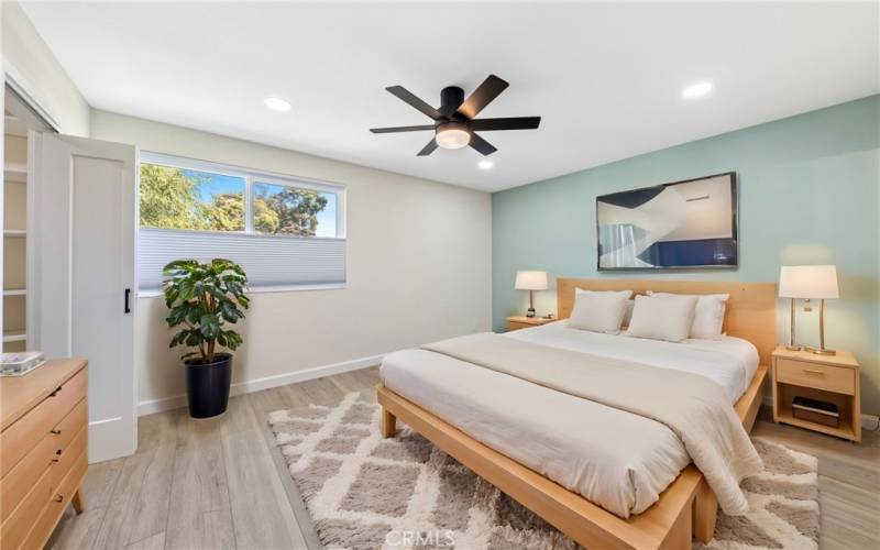 Master Bedroom Virtually Staged with light Breezy Beige Bedding.  The space in here does fit a king with space left over...