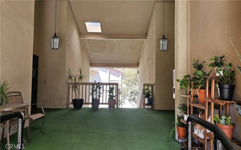 Tall Ceiling & Skylights keeps Foyer bright and Inviting - There's typically 4 homes per condo building,