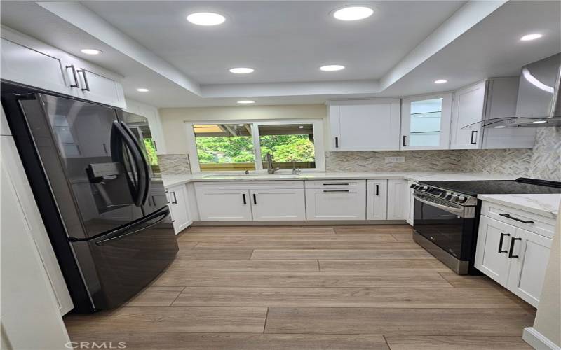 Light Bright and Contemporary Kitchen with form & function in every door and drawer