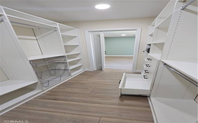 Master-Bedroom Walk-in Closet w/ two walls of Storage and.. Wait... wait... you had me when you said 