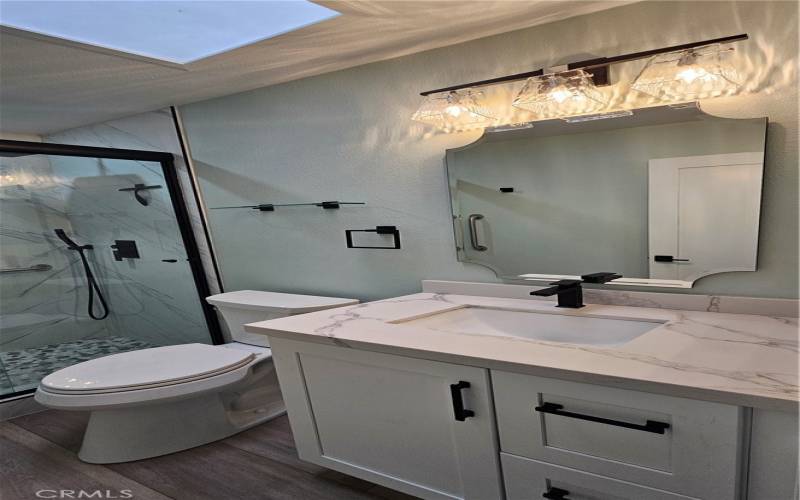 Master Bathroom with Skylights to help you save when & where you can right?!