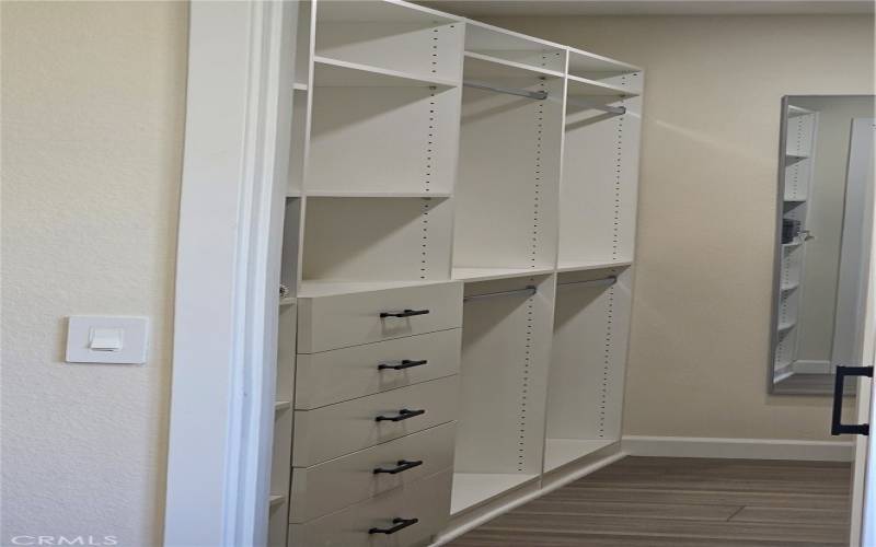 Master-Bedroom Walk-in Closet Left View with deep drawers & adjustable shelves - So big... You have room to share - Just Kidding IT's All Yours