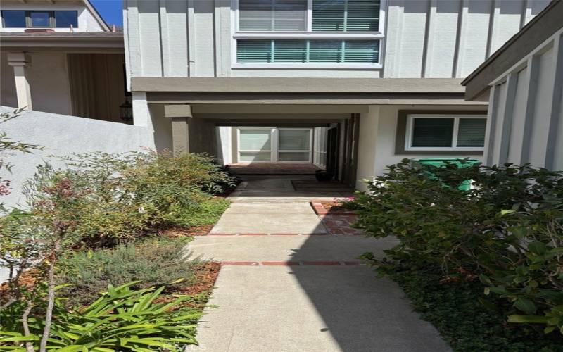 Garden walkway to front patio and front door.