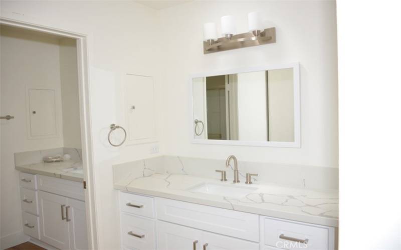 Double Primary Suite vanities - one in dressing area with NEW sinks, faucets, mirrors and light fixtures.