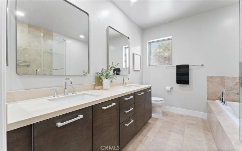 Dual-Sink Bathroom with soak-in tub and shower