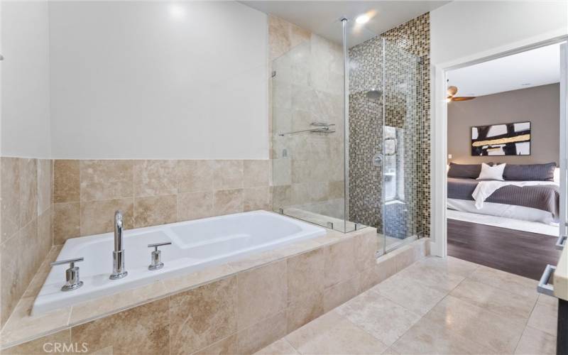 Dual-Sink Bathroom with soak-in tub and shower