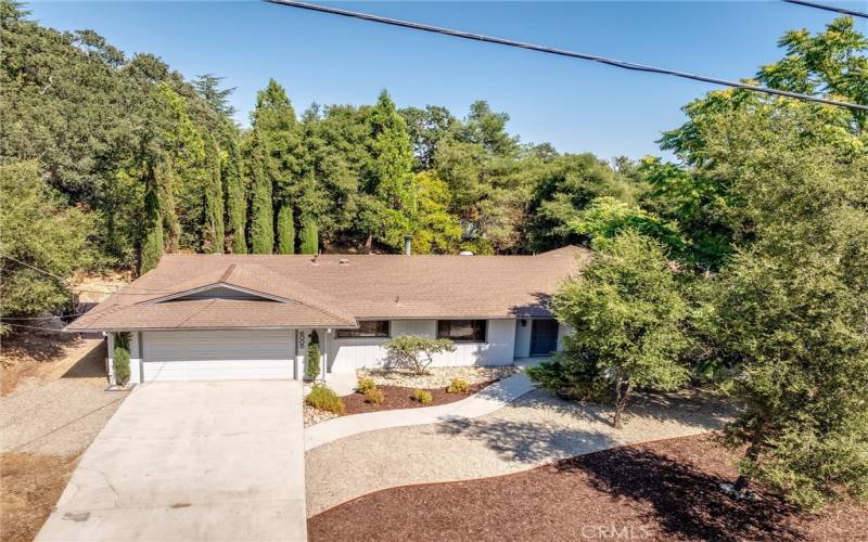 Large driveway with side yard allows plenty of space for boat or RV