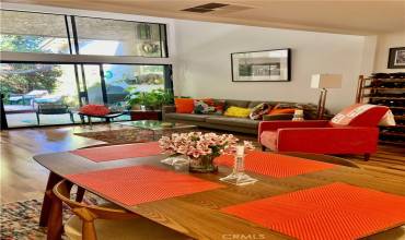 Living room/dining area with view of patio