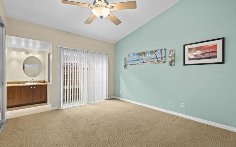 Large primary bedroom with vaulted ceilings