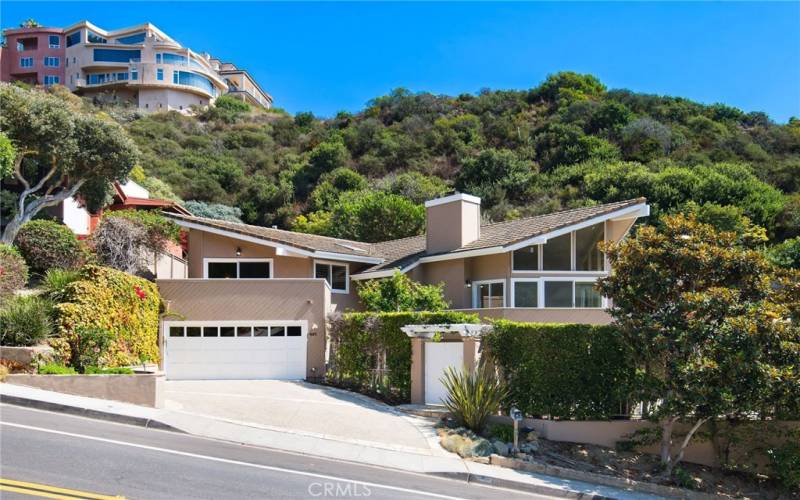 Ocean view home moments to Victoria Beach and the Montage -Two car garage and off street parking