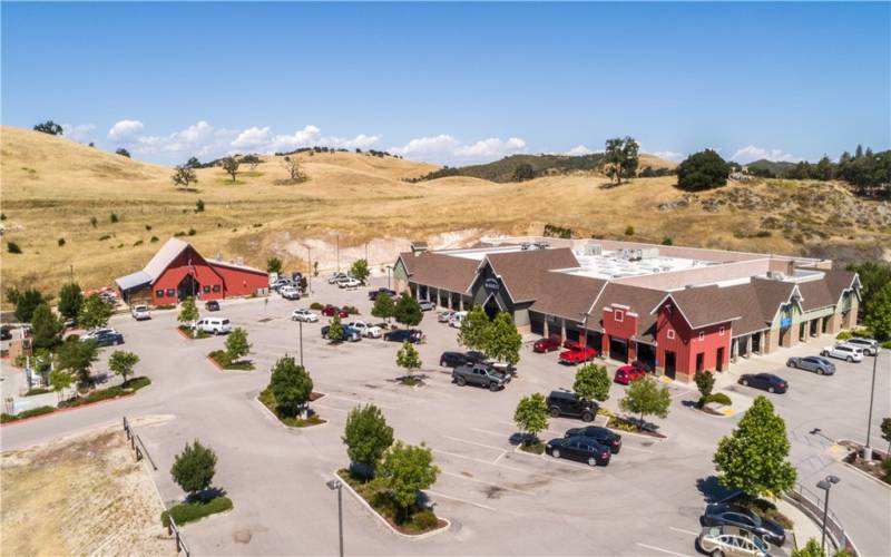 We a fantastic grocery store complete with butter and bakery with amazing dinners available nightly. We also have a pizza and grill restaurant. A Mexican Cafe just opened for breakfast and lunches. The right side of this photo is our gym, veterinary clinic and Physical Therapist.